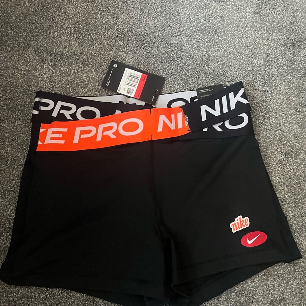 Nike Women's Black and Orange Pro Shorts